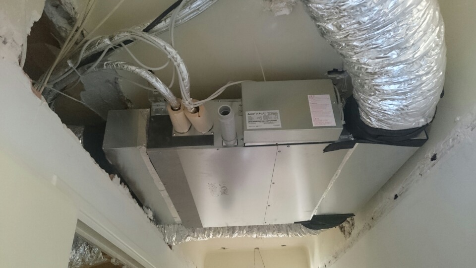 Gainable dans le couloir avec caisson reprise air coté