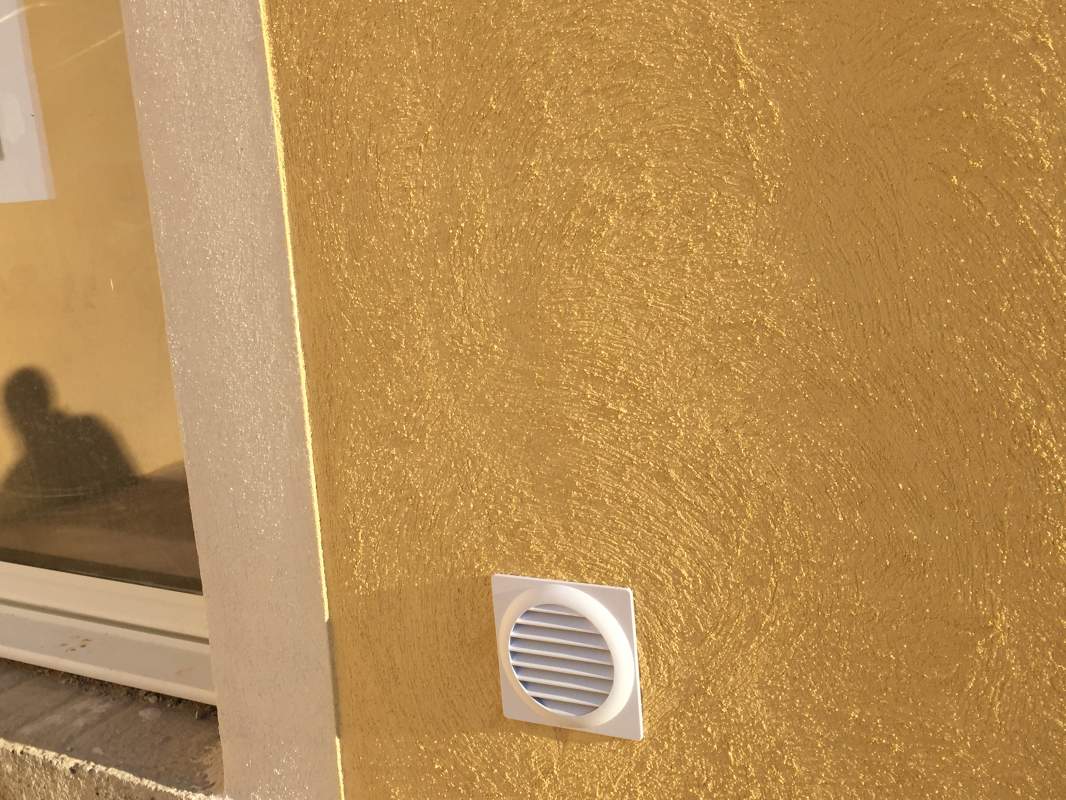 Bouche entrée air extérieur salon